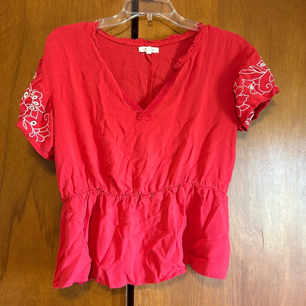 Red peplum shirt with beautiful floral detail